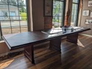Conference table with protector on top